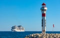 Cannes seafront panorama with lighthouse and MSC Meraviglia cruiser ship offshore French Riviera on Mediterranean Sea in France