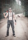 Cannibal Man in glasses with axel and two ghost on the road Royalty Free Stock Photo