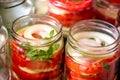 Canning fresh tomatoes with onions for winter in jelly marinade