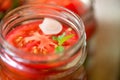 Canning fresh tomatoes with onions for winter in jelly marinade