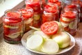 Canning fresh tomatoes with onions for winter in jelly marinade