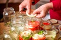 Canning fresh tomatoes with onions for winter in jelly marinade