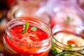 Canning fresh tomatoes with onions for winter in jelly marinade