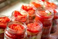 Canning fresh tomatoes with onions for winter in jelly marinade