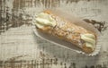 Cannoli on a wooden background Royalty Free Stock Photo