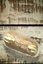 Cannoli on a wooden background Royalty Free Stock Photo