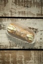 Cannoli on a wooden background Royalty Free Stock Photo