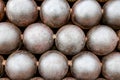 Cannon Balls arranged in a pile background Royalty Free Stock Photo