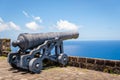 Cannon at Brimstone Hill Fortress on St. Kitts, West Indies faces the Caribbean Sea Royalty Free Stock Photo