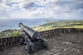 Cannon faces the Caribbean Sea at Brimstone Hill Fortress on Saint Kitts Royalty Free Stock Photo