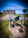 Cannon in front of French castle building at Old Fort Niagara Royalty Free Stock Photo