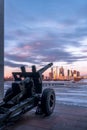 A cannon near the Victory Museum. Winners Square in Victory Park on Poklonnaya Hill in winter sunset.