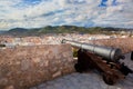 Cannon and panorama of Ibiza, Spain Royalty Free Stock Photo