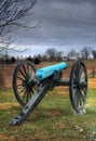 Cannon Points Toward Farmhouse