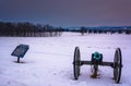 Cannon in a snow-covered field in Gettysburg, Pennsylvania. Royalty Free Stock Photo