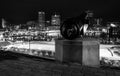 Cannon and view of the Baltimore Skyline at night from Federal H Royalty Free Stock Photo