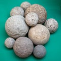 Cannonballs in different sizes made of stone. Ground find, 17th century. Mediaeval Schloss Burg, Castle Burg, Solingen, Germany