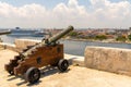 Cannons at Fort of Saint Charles and cruise ship in Havana Royalty Free Stock Photo