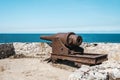 Cannons at Fort of Saint Charles or Fortaleza de San Carlos de la Cabana, cuban flag in Havana Royalty Free Stock Photo