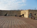 Near brickwalls in dell'Ovo castle under cloudy sky