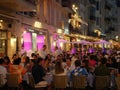 Cannses, France - June 2022: Street restaurants in Cannes Tourists at dusk or night