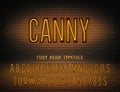Canny sign with narrow orange neon alphabet on dark brick background. Foxy night light glowing effect font with numbers Royalty Free Stock Photo