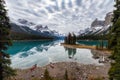 Canoe anchored with canadian rockies reflection on Maligne lake at Spirit island in Jasper national park Royalty Free Stock Photo