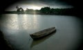 Canoe as a traditional crossing on the Benenai river, Malacca, East Nusa Tenggara, Indonesia during the flood season Royalty Free Stock Photo