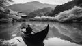 canoe on lake black and white photo Boatman punting the boat at river in autumn season along the river