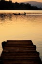 Canoe on lake at sunset Royalty Free Stock Photo