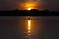 Canoe on lake at sunset Royalty Free Stock Photo