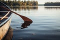 Canoe on a lake wooden boat kayak in water summer canoeing kayaking autumn travelling fresh calm still water rural