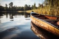 Canoe on a lake wooden boat kayak in water summer canoeing kayaking autumn travelling fresh calm still water rural