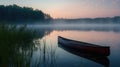 Canoe on a Misty Lake at Sunrise. Resplendent. Royalty Free Stock Photo