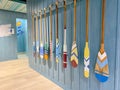 Canoe paddles was decortion on the walkway wall in Blueport Departmentstore reflect to the river and sea because the department