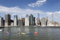 canoe polo in east river new york city with lower manhattan skyline in the background Royalty Free Stock Photo