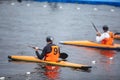 Canoe polo match, two teams play kayak polo game outdoor competition in the lake river, water sport Royalty Free Stock Photo