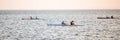 Canoe racing in a greek town in a summer day