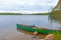 Canoe Ready on a Calm Lake Royalty Free Stock Photo