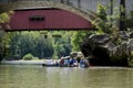 Canoe rides under the covered bridge