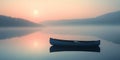 Canoe sits in a lake at sunset Royalty Free Stock Photo