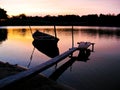 Canoe in sunset Royalty Free Stock Photo