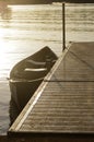 Canoe tied to dock Royalty Free Stock Photo