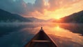 Canoe on tranquil lake at sunset, misty hills, scenic, hills Royalty Free Stock Photo