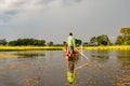 Canoe trip with traditional mokoro boat on river through Okavango Delta near Maun, Botswana Africa