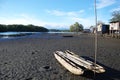 Canoe at village river coast