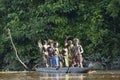 Canoe war ceremony of Asmat people. Headhunter of a tribe of Asmat in a mask with an o Royalty Free Stock Photo