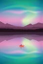 Canoeing adventure with a boat on the lake at aurora borealis Royalty Free Stock Photo