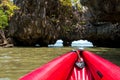 Canoeing through the cave into the lagoon at Phang nga bay, Thai