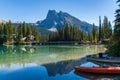 Canoeing on Emerald Lake in summer sunny day. Yoho National Park, Canadian Rockies.